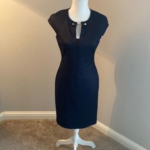 Tommy H navy with a little summer dress with gold bar accent